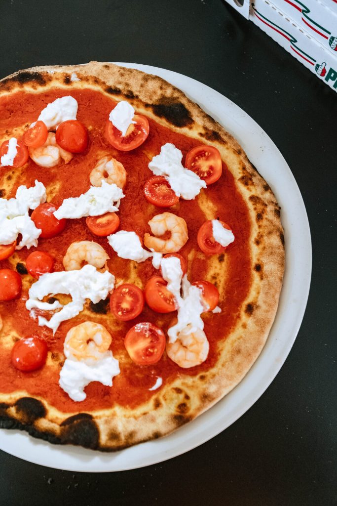 Una pizza del ristorante interno al parco acquatico Aquaplanet